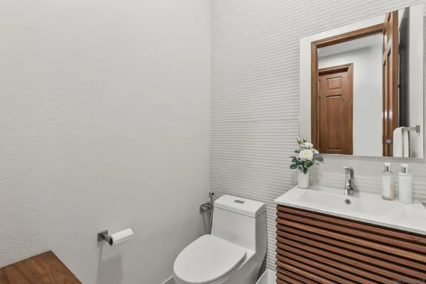 a view of a wooden door and a window