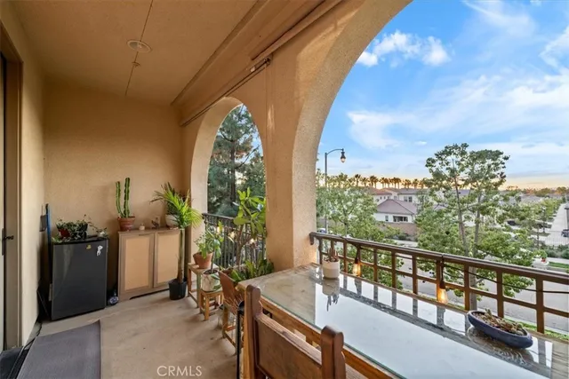 a view of a balcony with chairs