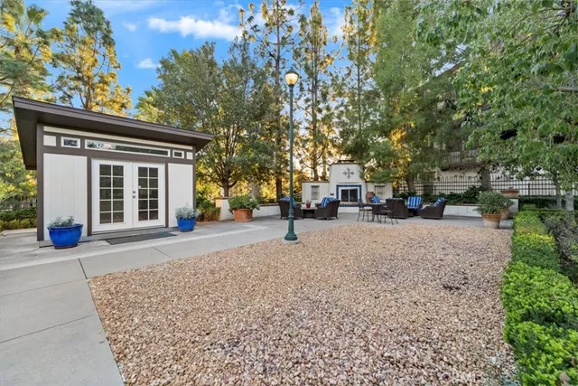 a view of road with card parked on side and road