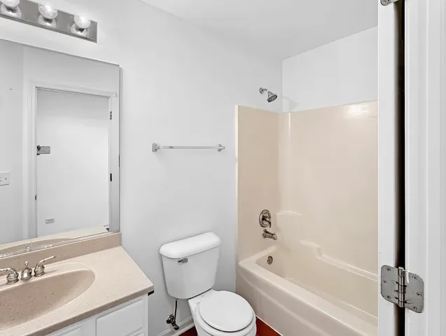 a bathroom with a sink a toilet and a bathtub