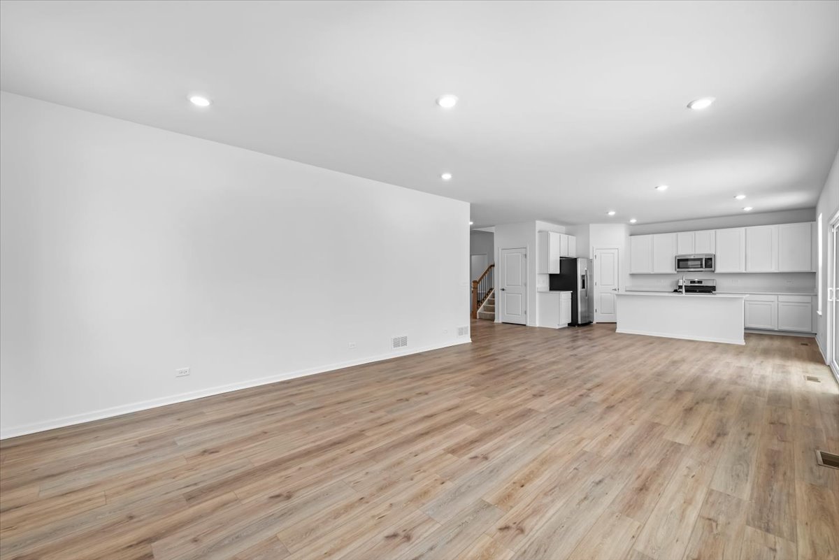 81 Sweetflag Circle Elgin, IL 60124 - Photo 18 of 51 a view of kitchen with wooden floor
