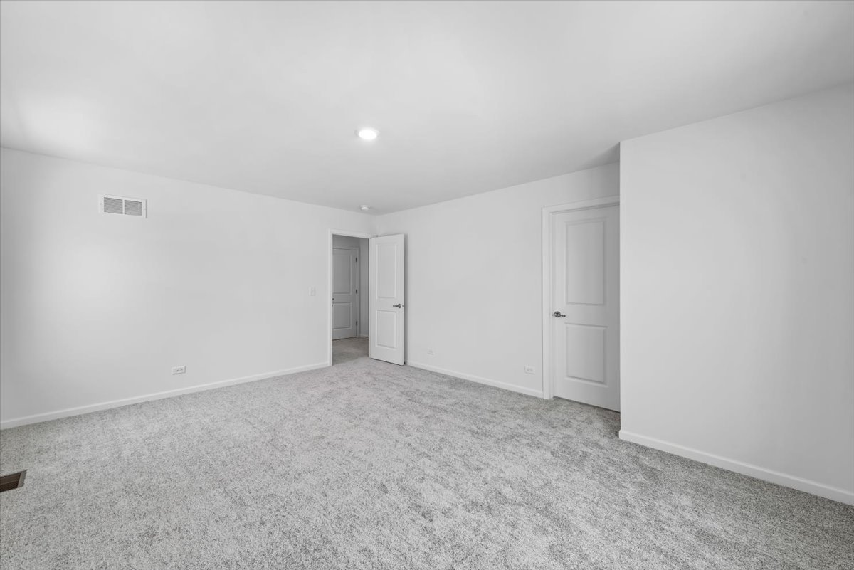 81 Sweetflag Circle Elgin, IL 60124 - Photo 22 of 51 a view of an empty room