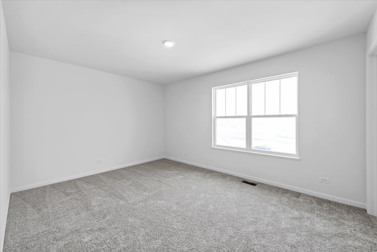 81 Sweetflag Circle Elgin, IL 60124 - Photo 25 of 51 an empty room with a window