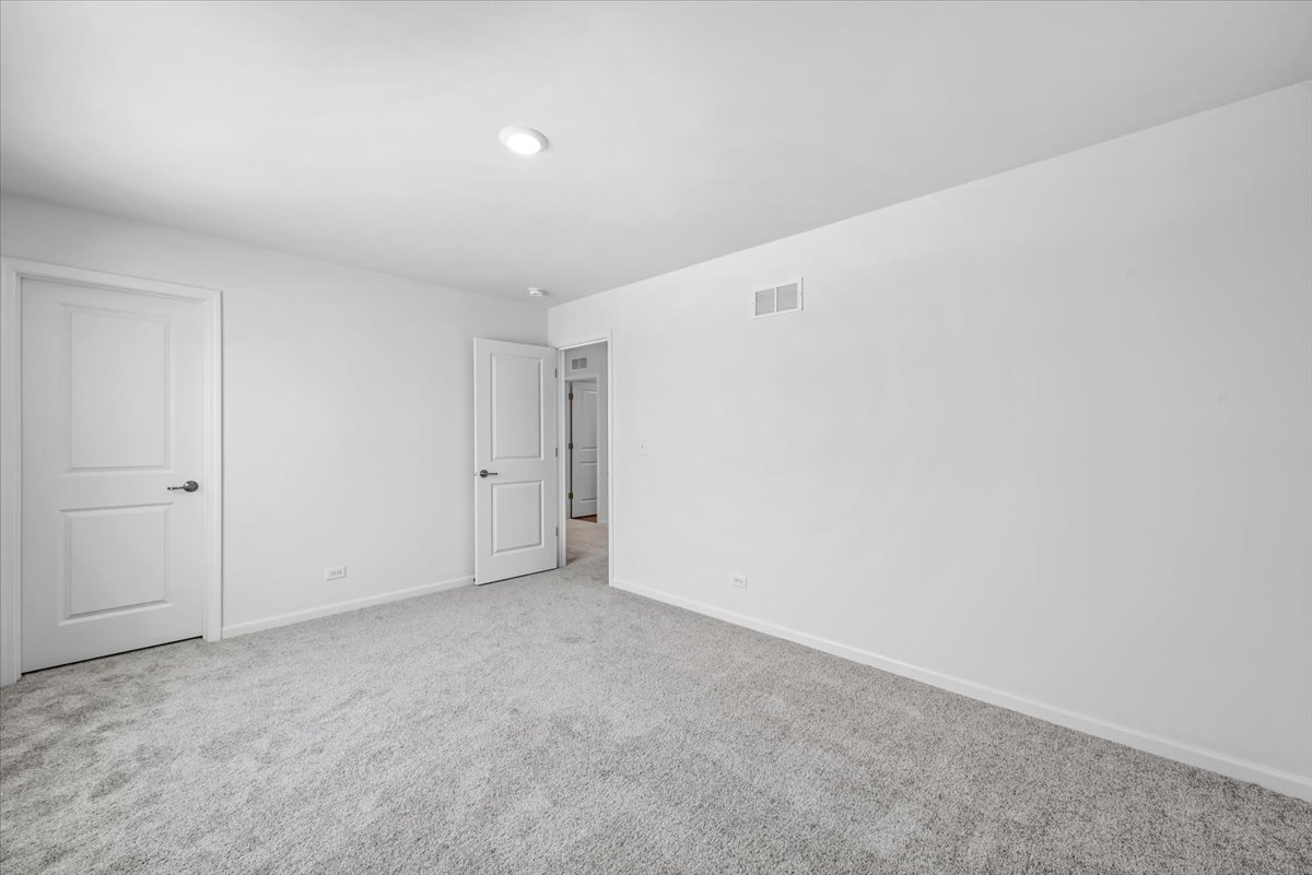 81 Sweetflag Circle Elgin, IL 60124 - Photo 26 of 51 a view of an empty room