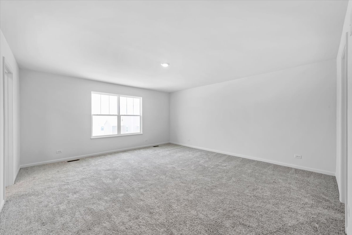 81 Sweetflag Circle Elgin, IL 60124 - Photo 27 of 51 an empty room with a window