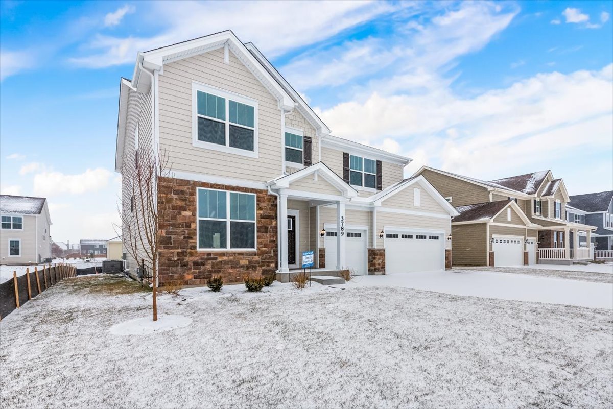 81 Sweetflag Circle Elgin, IL 60124 - Photo 3 of 51 a view of a house with wooden fence