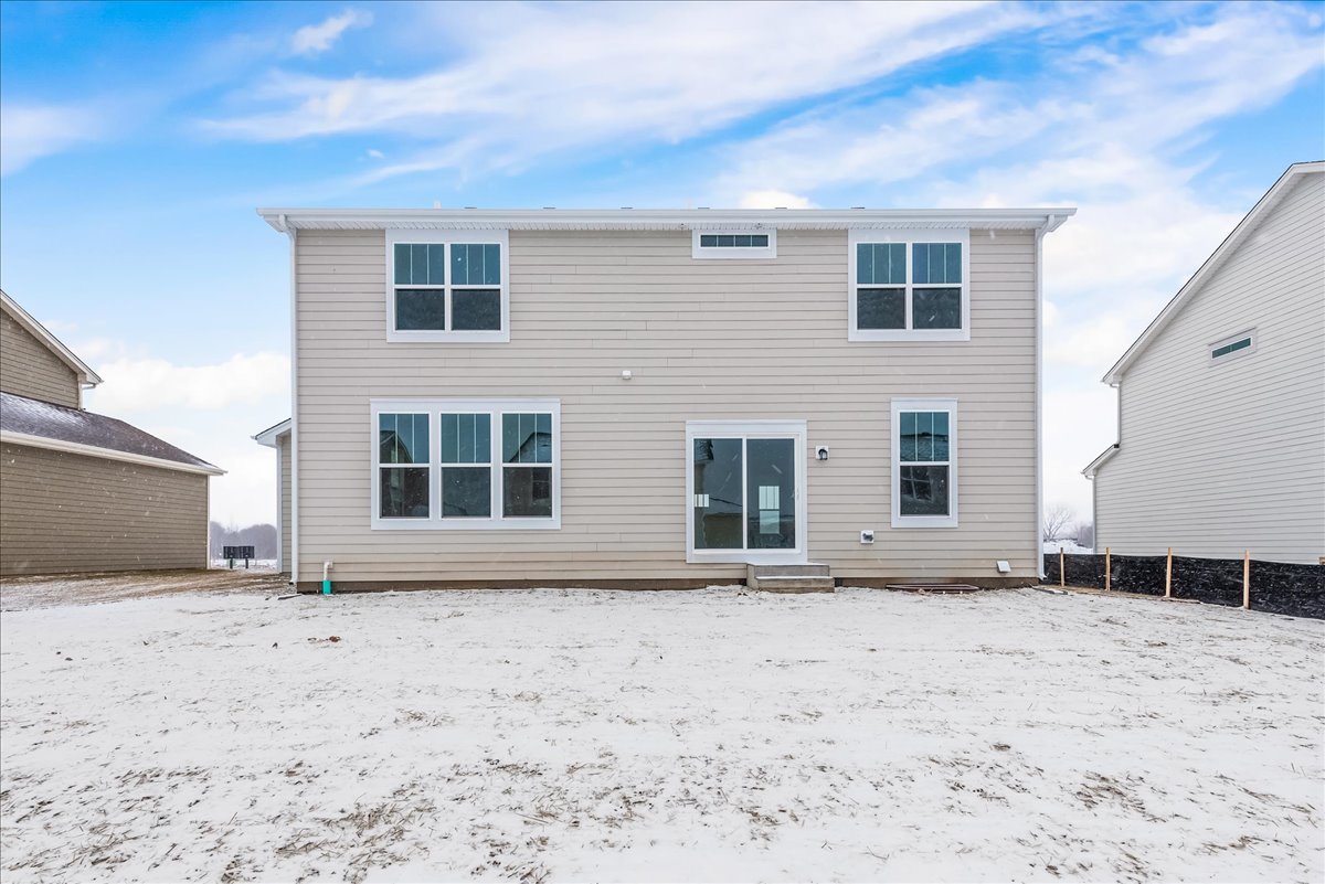 81 Sweetflag Circle Elgin, IL 60124 - Photo 5 of 51 a view of a house with a yard
