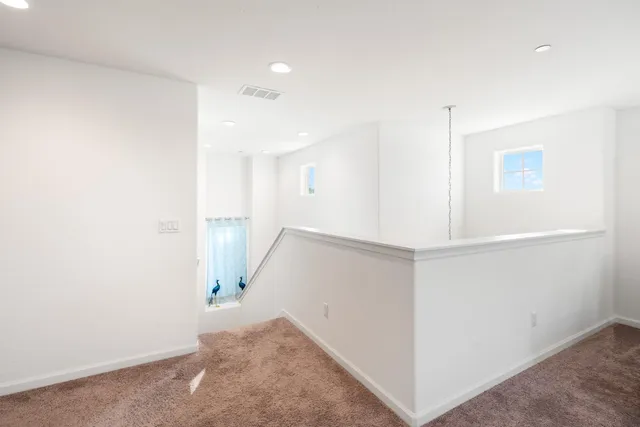 a view of a hallway with closet