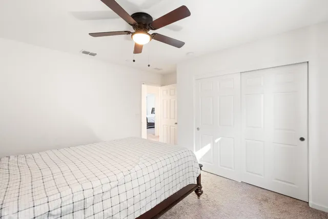 a bathroom with 2 sink and a mirror