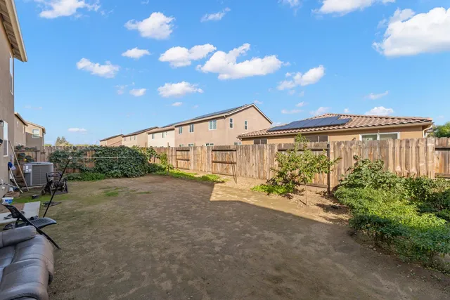 front view of a house with a street