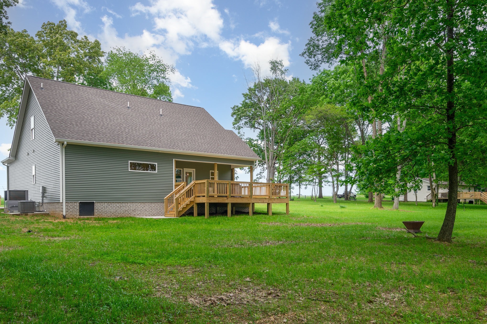 4345 South Garrett Road Springfield, TN 37172 - Photo 28 of 30 a front view of a house with a garden and trees