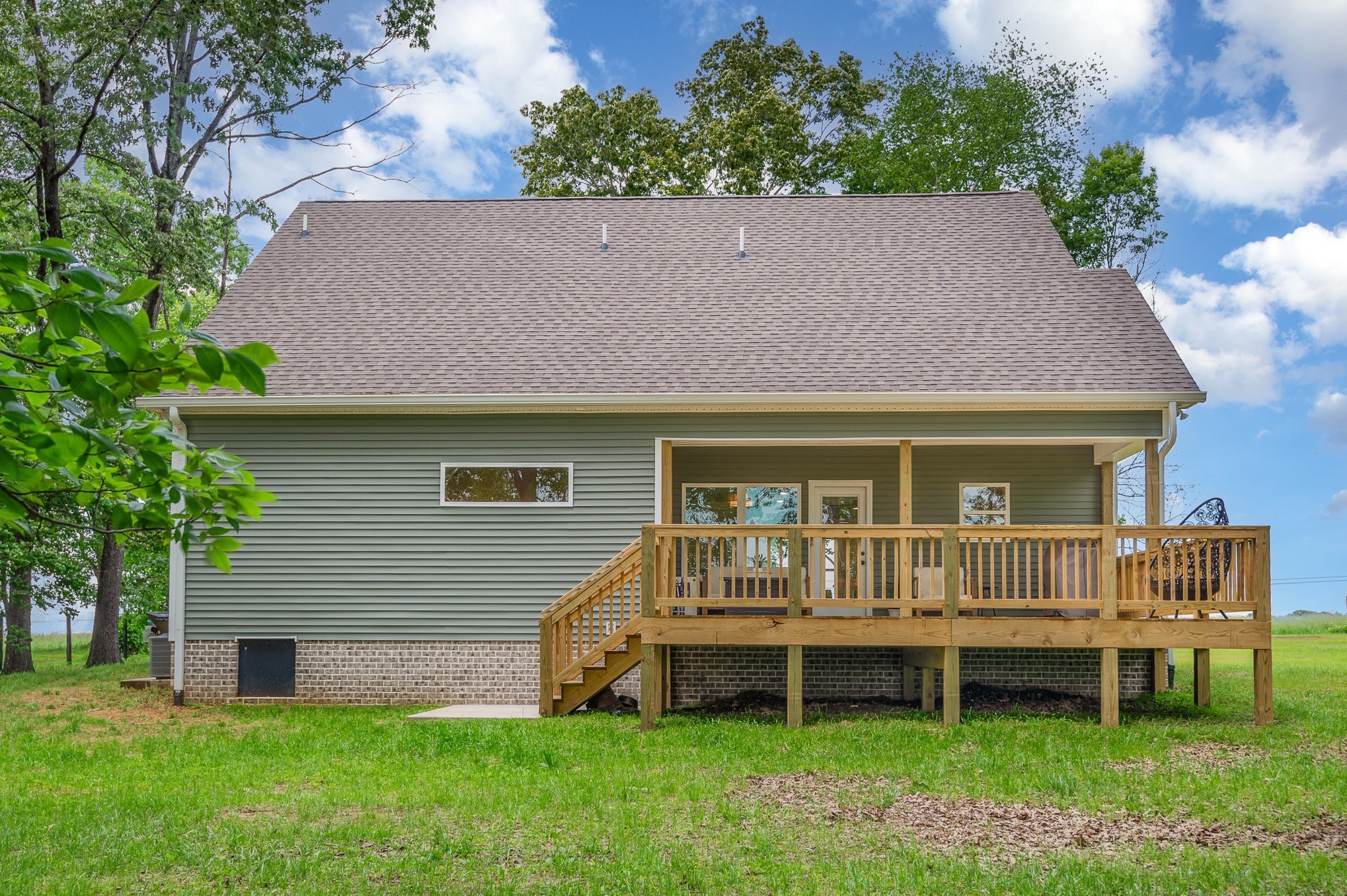4345 South Garrett Road Springfield, TN 37172 - Photo 29 of 30 a front view of a house with a garden and deck