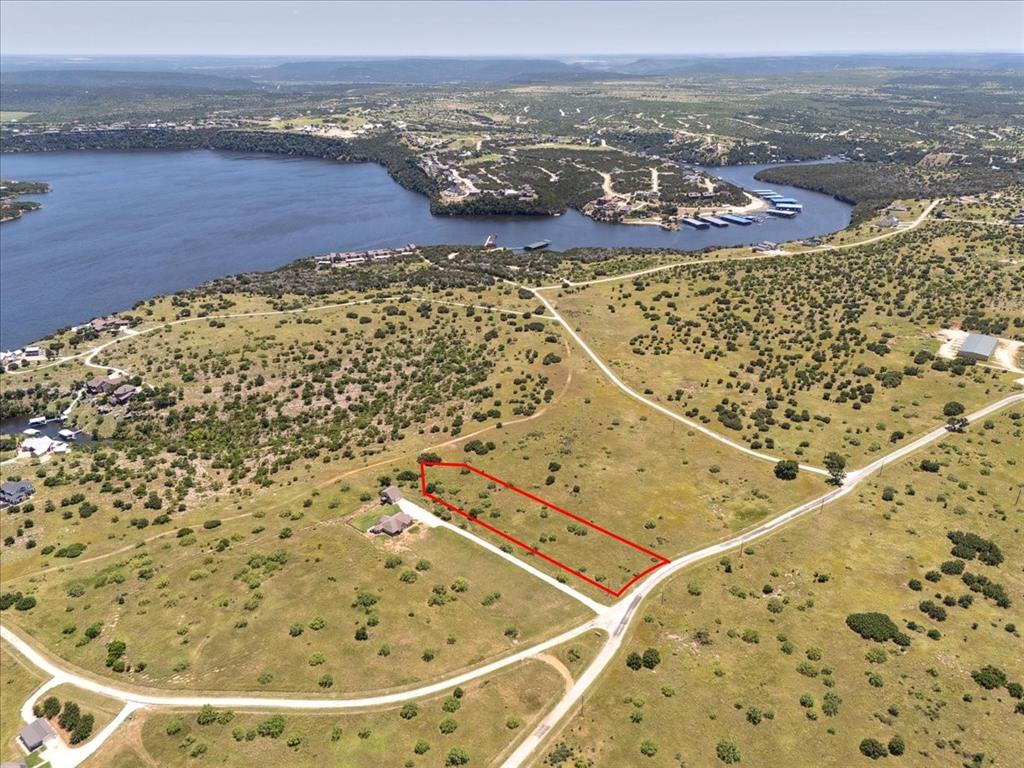 Lot 77 Lake Shore Loop Graford, TX 76449 - Photo 11 of 20 Aerial View of Lot and Lake Featuring Property Parcel Outlined