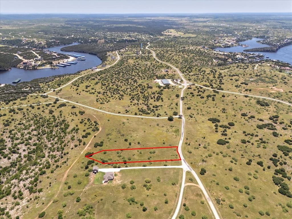 Lot 77 Lake Shore Loop Graford, TX 76449 - Photo 12 of 20 Aerial View of Lot and Lake Featuring Property Parcel Outlined