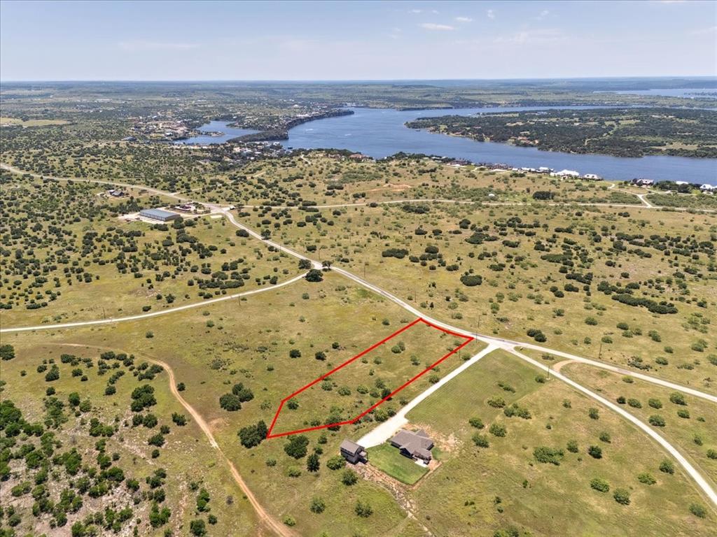Lot 77 Lake Shore Loop Graford, TX 76449 - Photo 13 of 20 Aerial View of Lot and Lake Featuring Property Parcel Outlined
