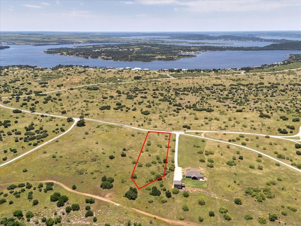 Lot 77 Lake Shore Loop Graford, TX 76449 - Photo 14 of 20 Aerial View of Lot and Lake Featuring Property Parcel Outlined