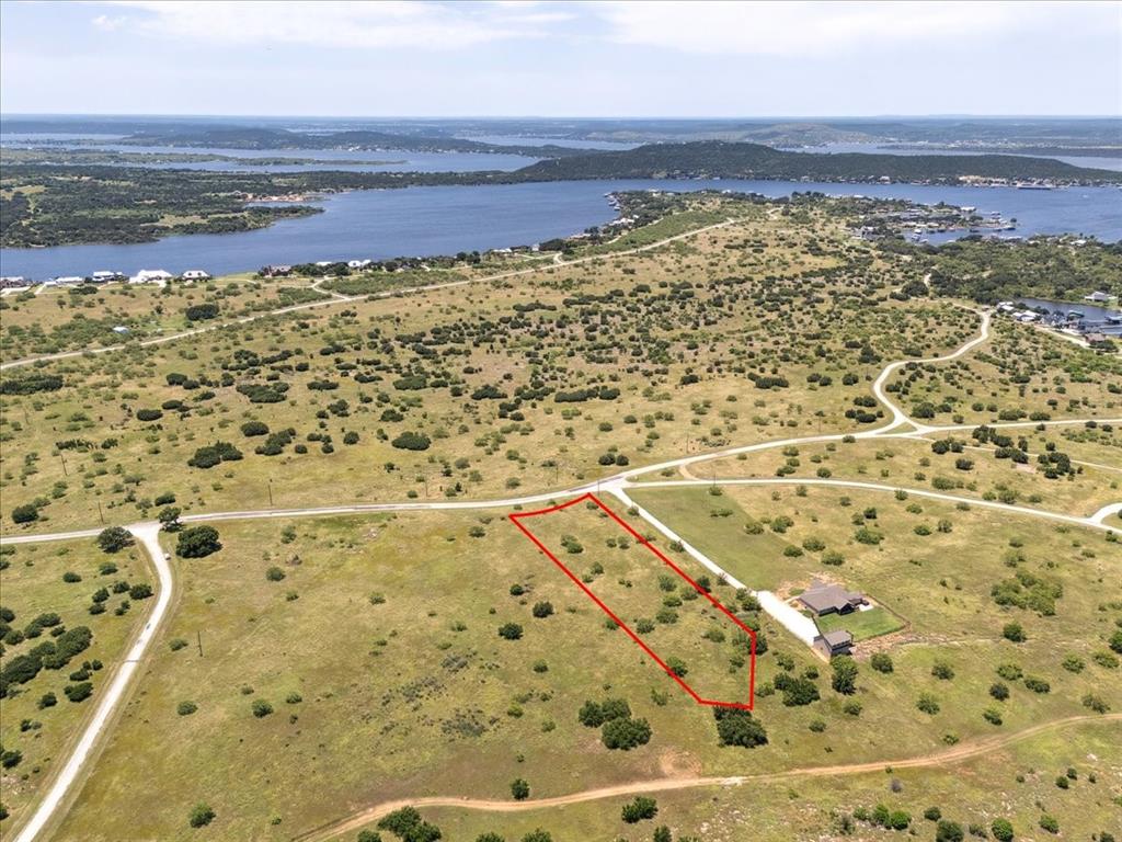 Lot 77 Lake Shore Loop Graford, TX 76449 - Photo 15 of 20 Aerial View of Lot and Lake Featuring Property Parcel Outlined