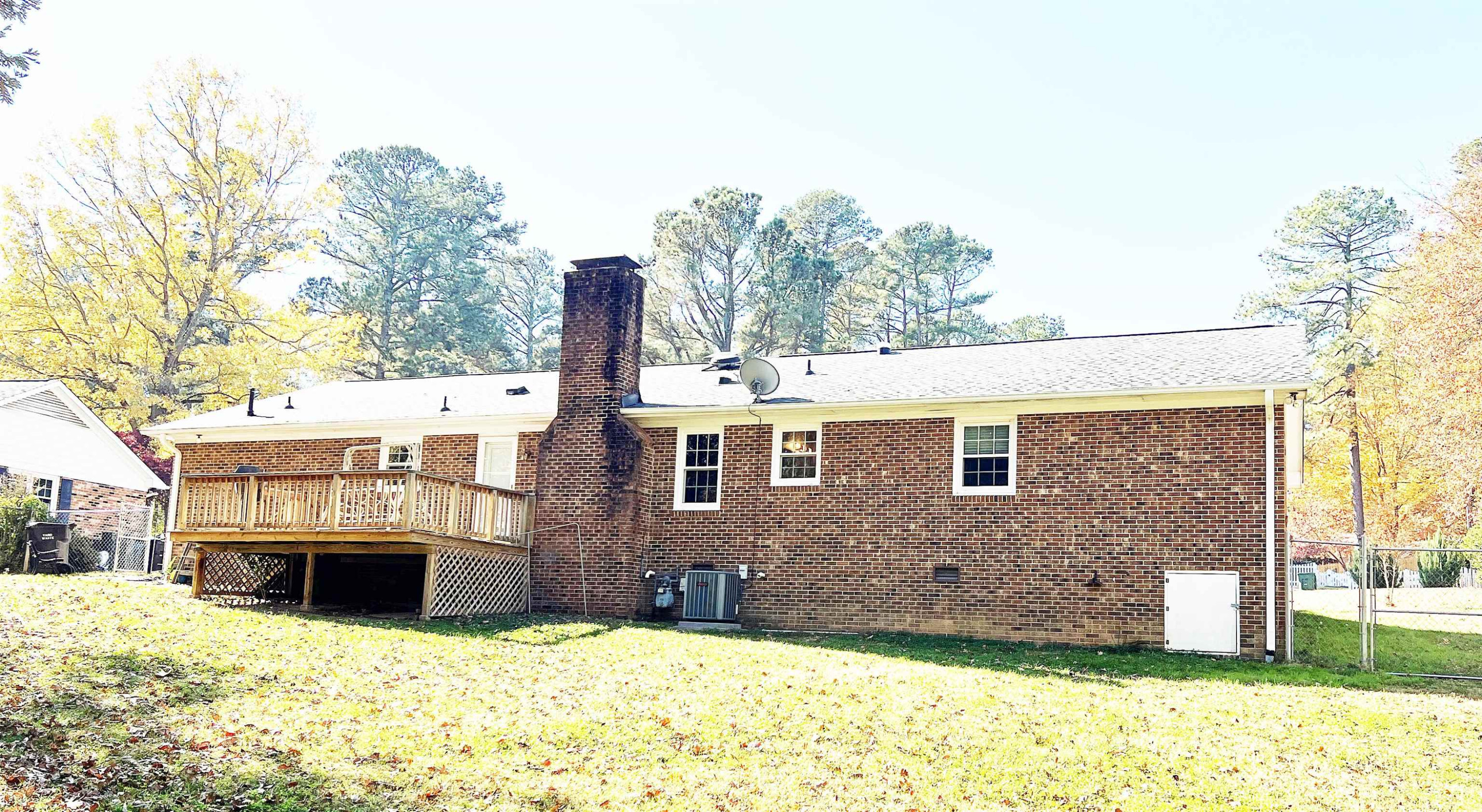 714 Duluth Street Durham, NC 27705 - Photo 4 of 5 a view of a house with a yard