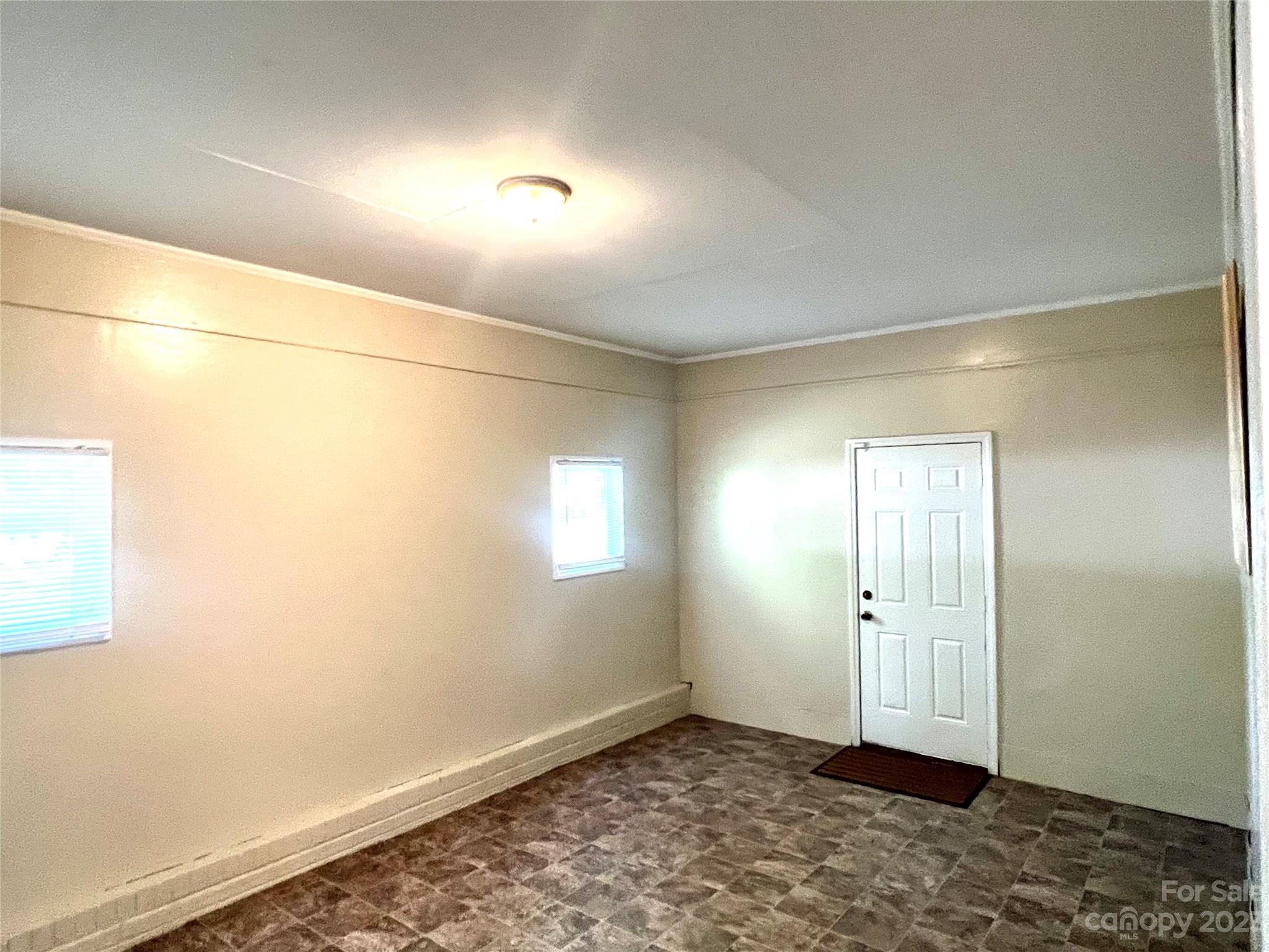 911 Taylor Street Wingate, NC 28174 - Photo 12 of 12 a view of an empty room