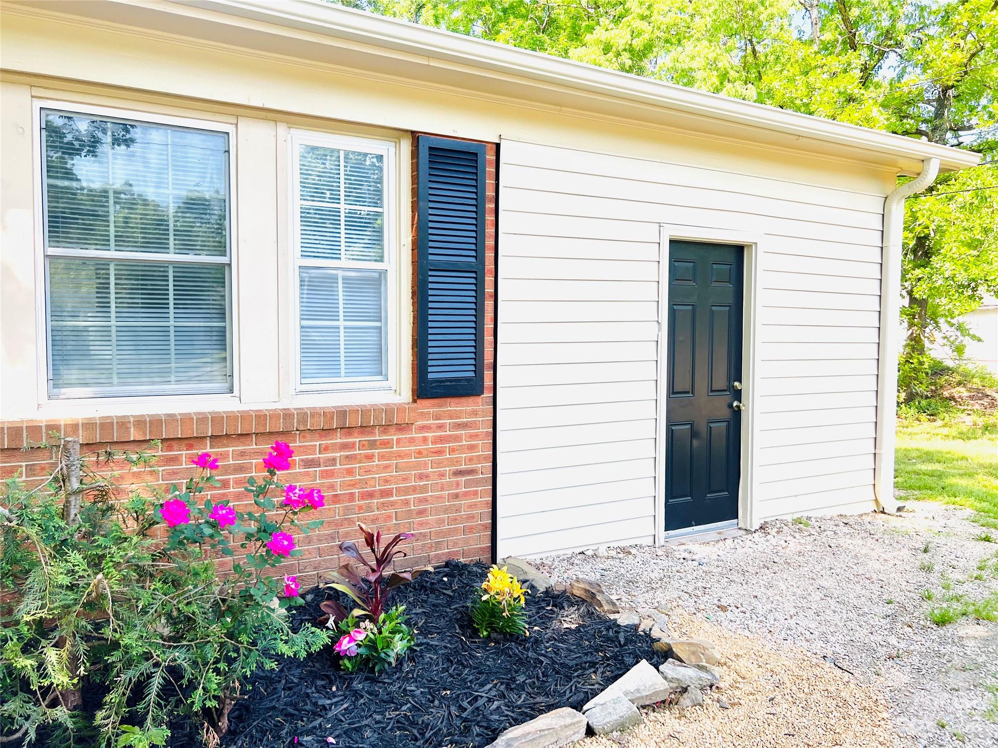 911 Taylor Street Wingate, NC 28174 - Photo 5 of 12 a view of a entryway front of house