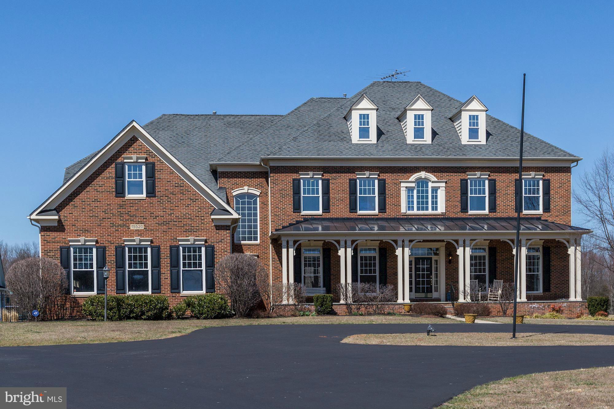 15520 Mount Nebo Road Poolesville, MD 20837 - Photo 1 of 30 a front view of a house with a yard