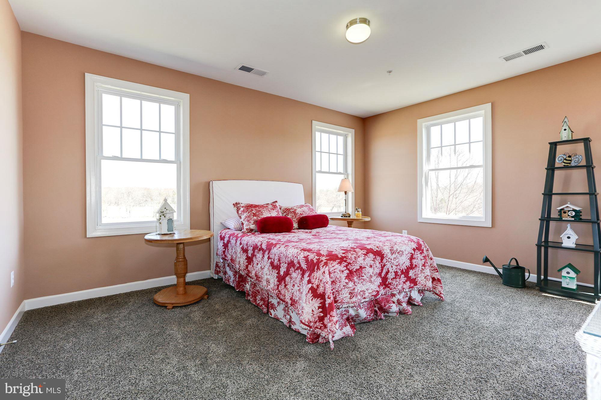 15520 Mount Nebo Road Poolesville, MD 20837 - Photo 23 of 30 a bedroom with a bed and a window