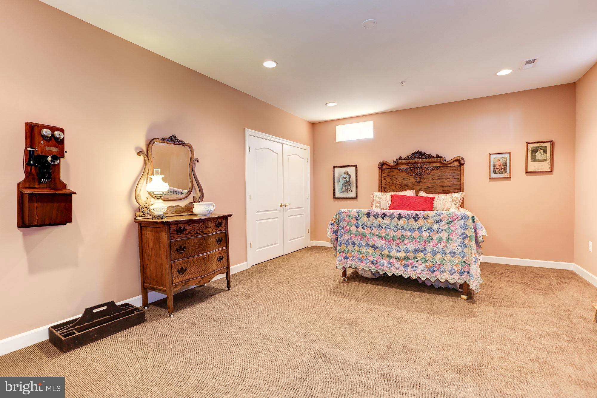 15520 Mount Nebo Road Poolesville, MD 20837 - Photo 27 of 30 a bedroom with furniture and a bed