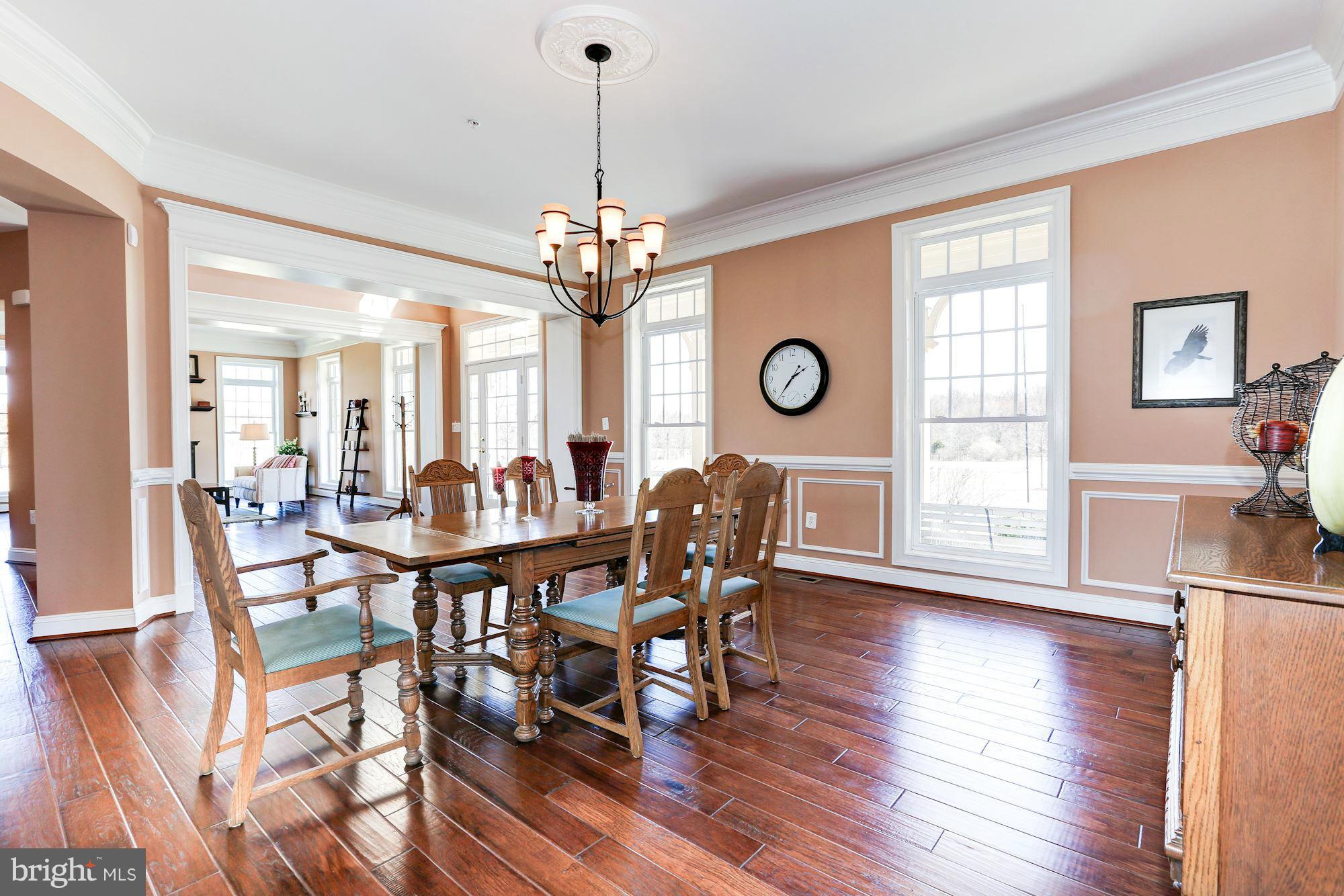 15520 Mount Nebo Road Poolesville, MD 20837 - Photo 10 of 30 a view of a dining room with furniture window and wooden floor