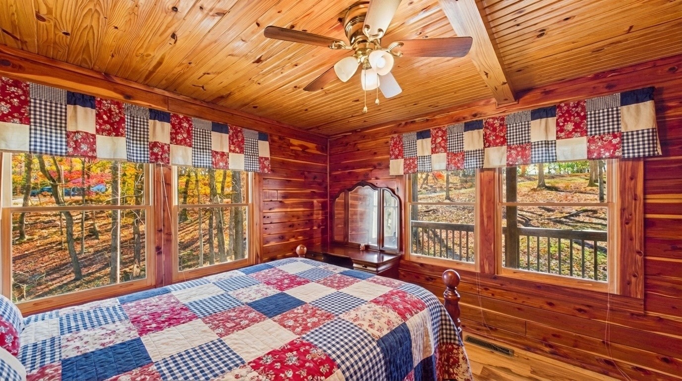 22 Roberts Lane Cadiz, KY 42211 - Photo 12 of 84 a bedroom with a bed next to a window