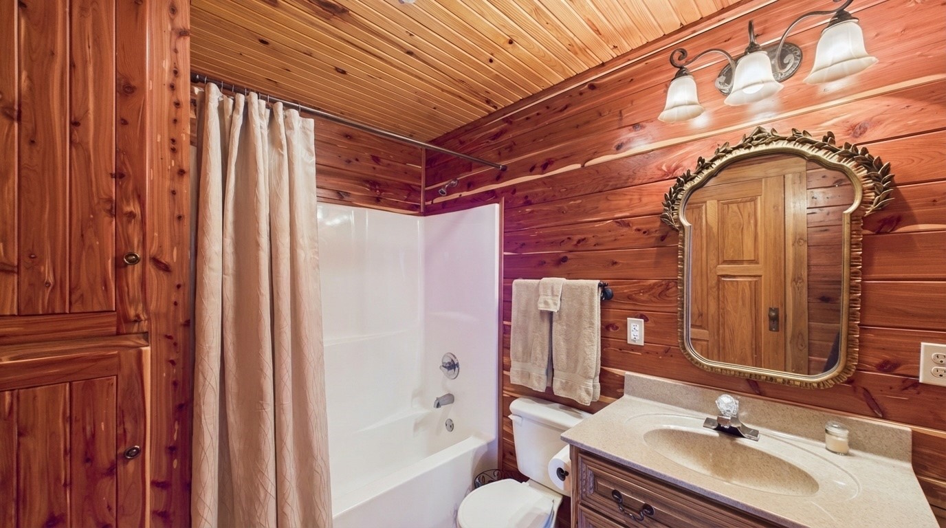 22 Roberts Lane Cadiz, KY 42211 - Photo 14 of 84 a bathroom with a sink and a mirror