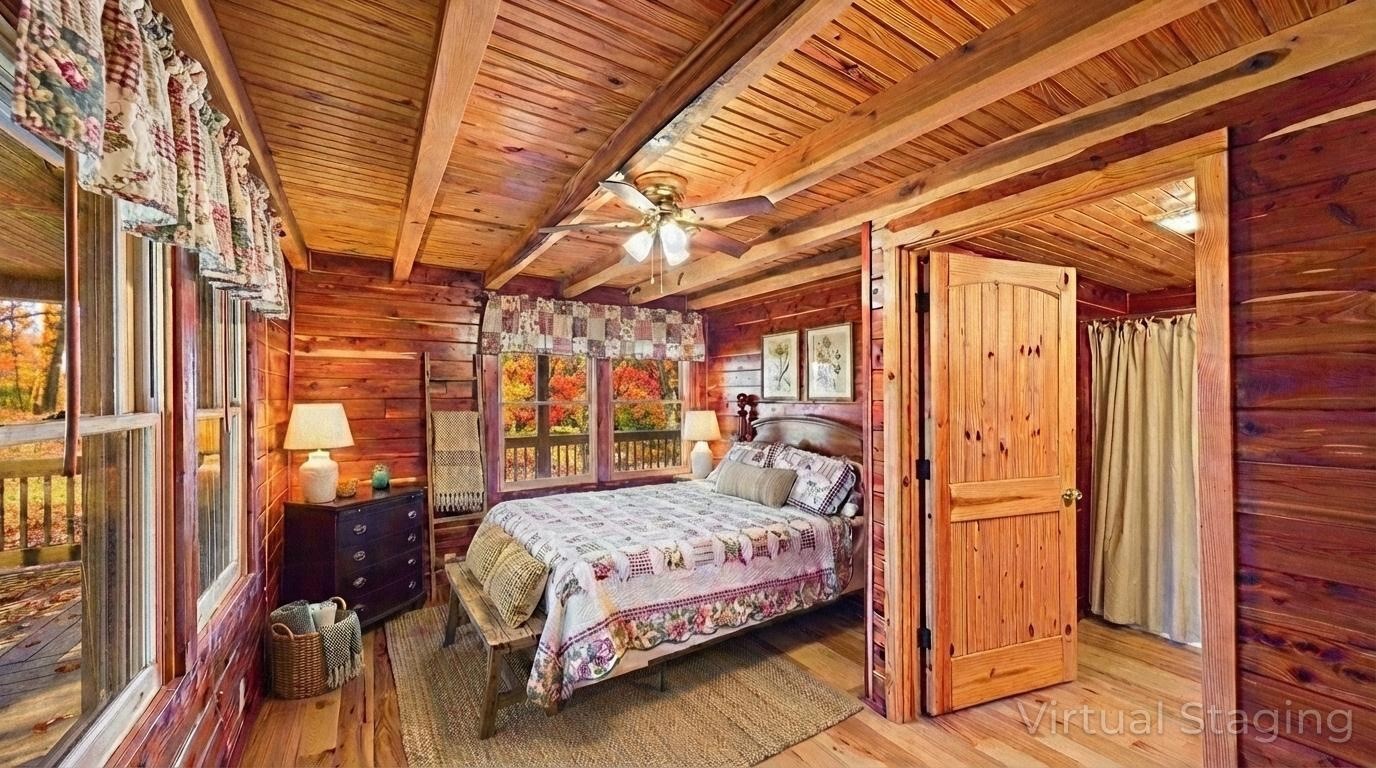 22 Roberts Lane Cadiz, KY 42211 - Photo 16 of 84 a bedroom with a bed and a glass door