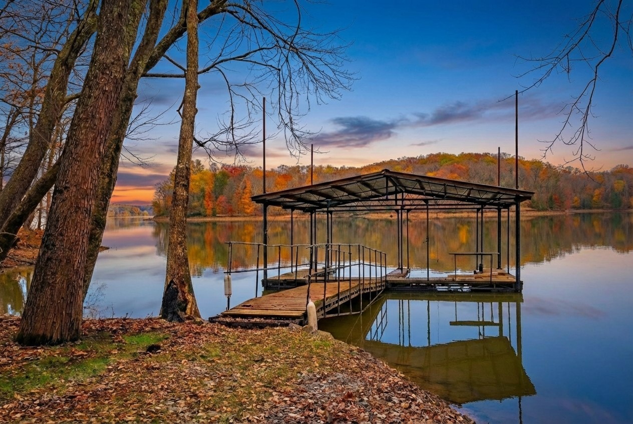22 Roberts Lane Cadiz, KY 42211 - Photo 3 of 84 a view of a roof deck with a chair and table