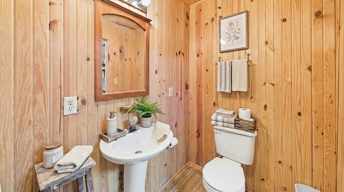 22 Roberts Lane Cadiz, KY 42211 - Photo 37 of 84 a bathroom with a toilet a sink and a shower