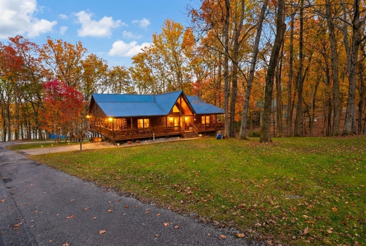 22 Roberts Lane Cadiz, KY 42211 - Photo 83 of 84 a view of a house with backyard and tree