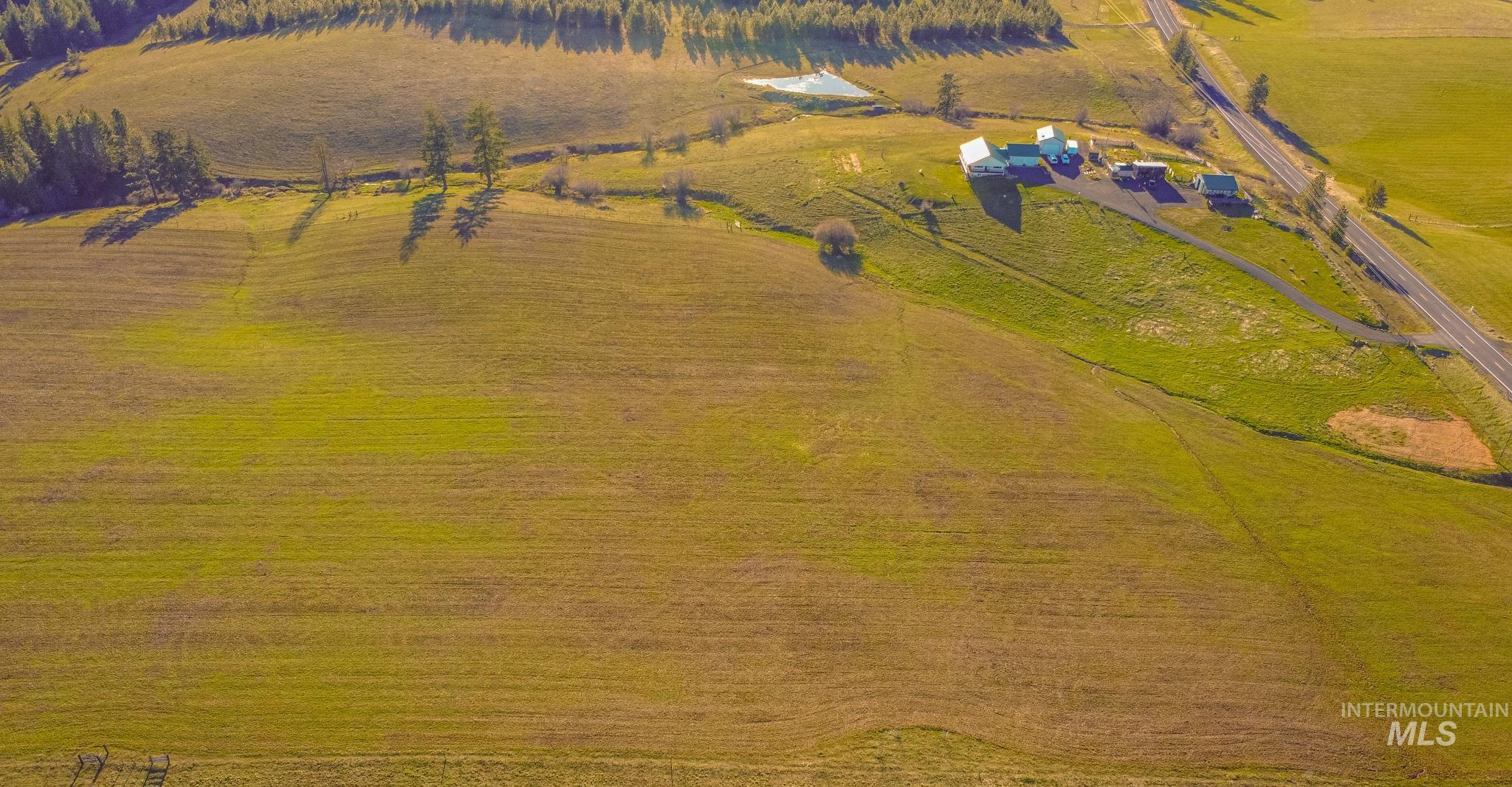 5404 Freeman Creek Road Lenore, ID 83541 - Photo 5 of 50 Aerial view of sparsely populated area with agricultural land
