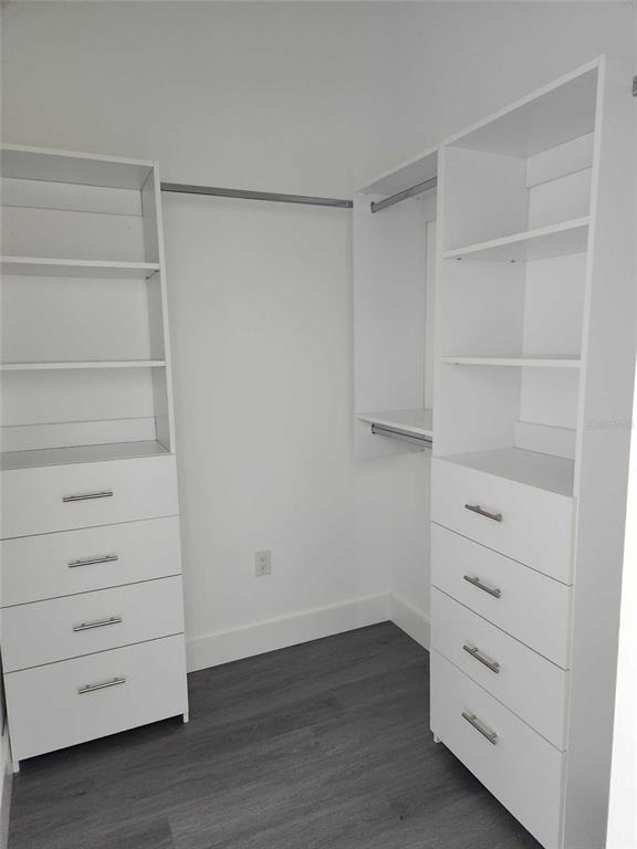 9211 Northcliffe Boulevard Spring Hill, FL 34606 - Photo 16 of 30 a view of walk in closet