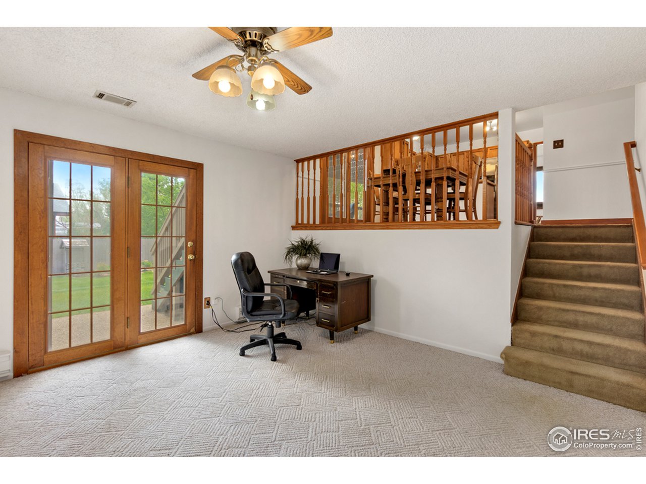 3100 Rifle Road Laporte, CO 80535 - Photo 23 of 38 Lower level family room with french doors to patio