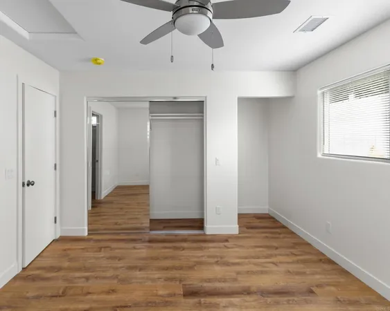 a view of an empty room and window
