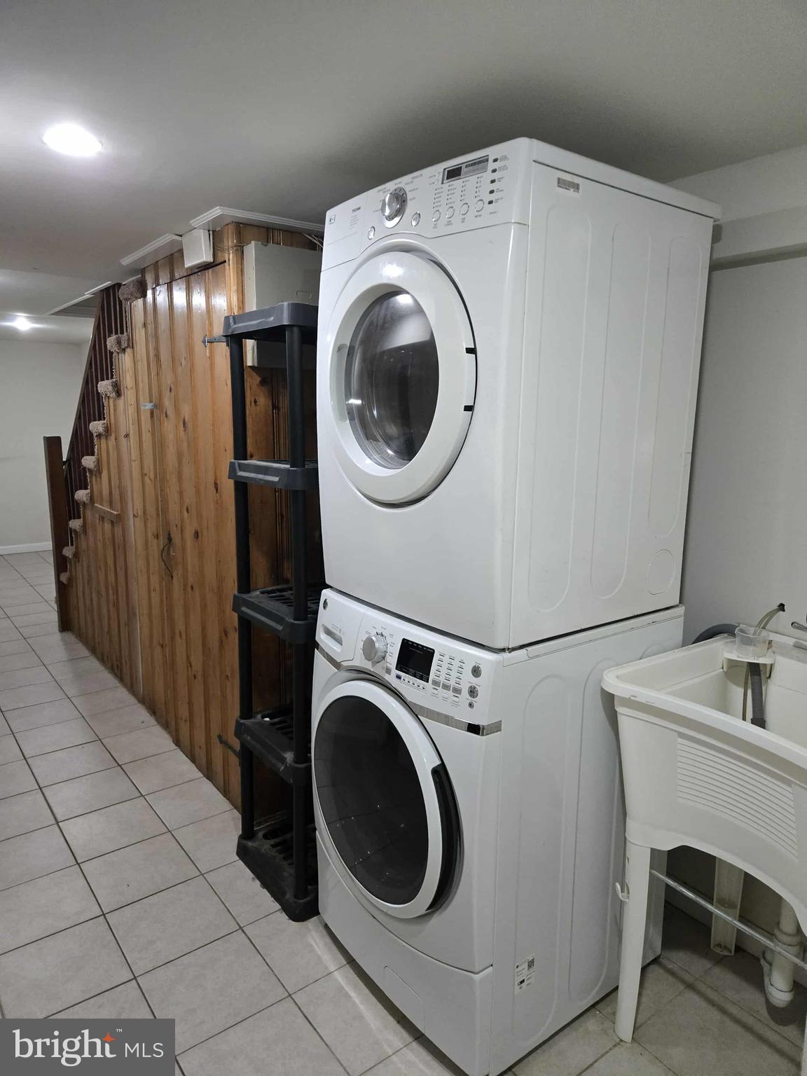 4408 Shamrock Avenue Baltimore, MD 21206 - Photo 11 of 18 a utility room with dryer and washer