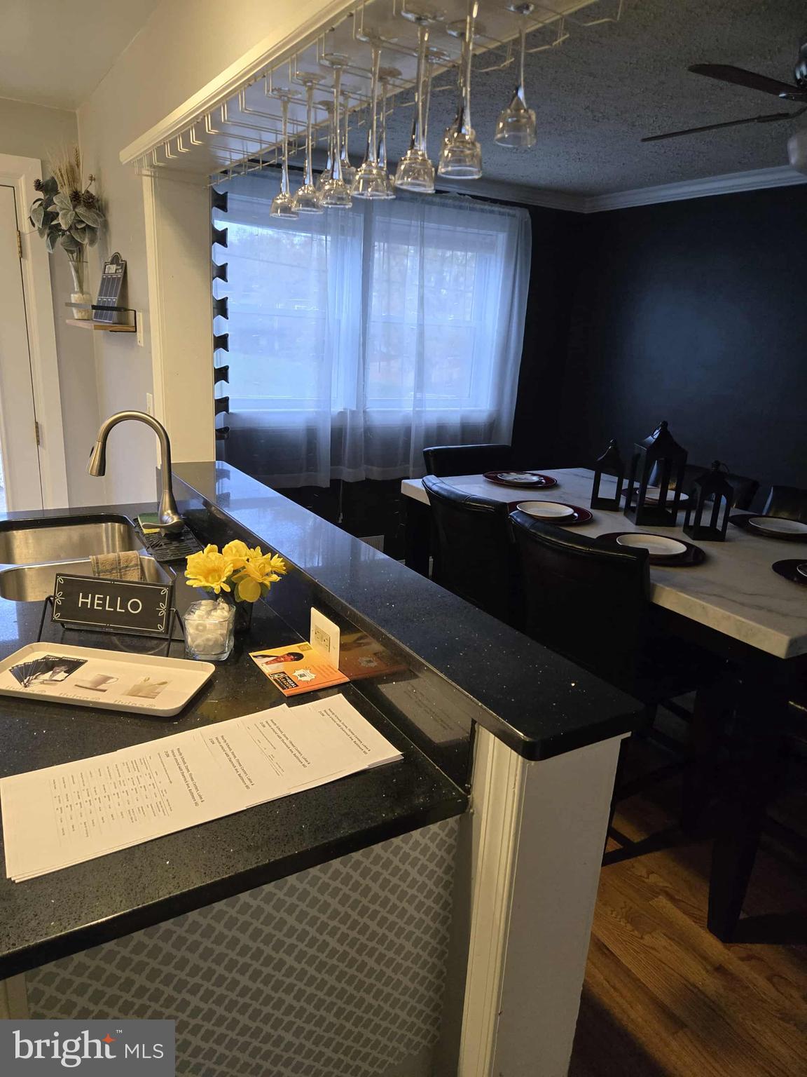4408 Shamrock Avenue Baltimore, MD 21206 - Photo 5 of 18 a kitchen with a sink and cabinets