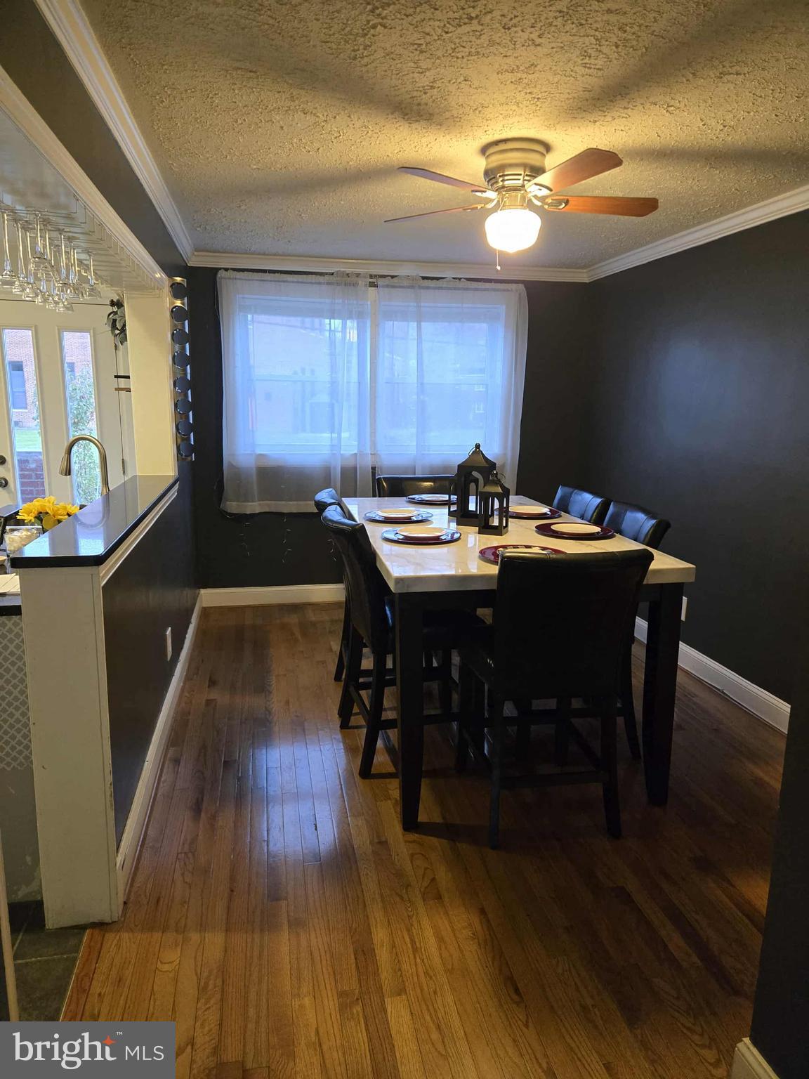 4408 Shamrock Avenue Baltimore, MD 21206 - Photo 6 of 18 a dining room with furniture and wooden floor