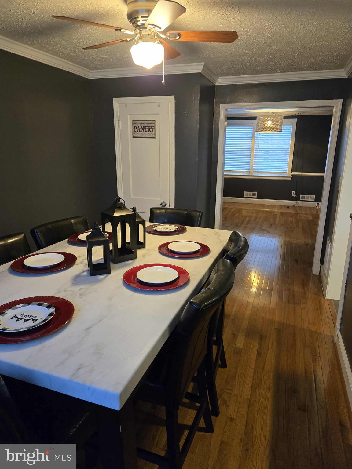 4408 Shamrock Avenue Baltimore, MD 21206 - Photo 7 of 18 a view of a dining room with furniture