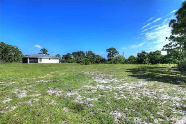 a view of a golf course with a garden