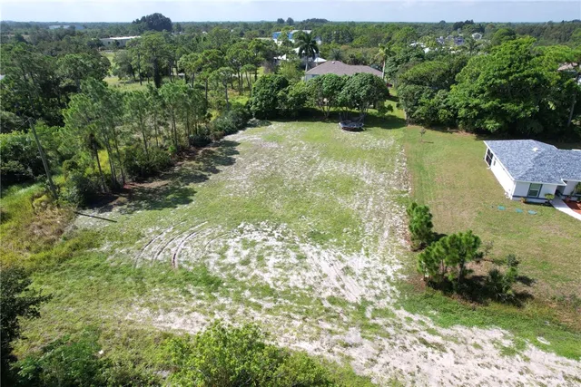 a view of a garden with an outdoor space