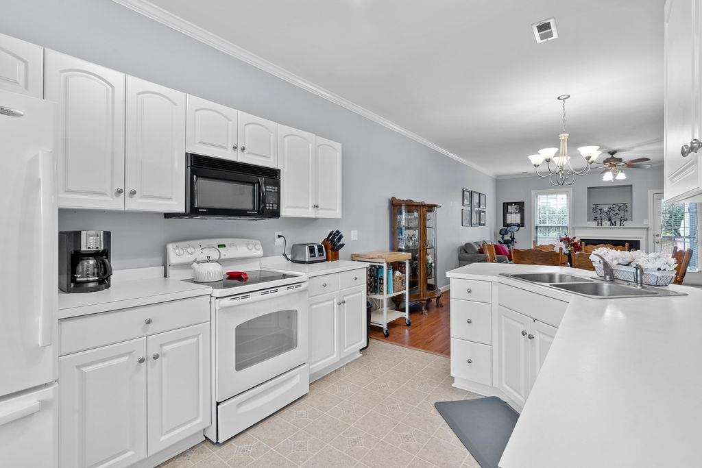 9243 Grassington Way Raleigh, NC 27615 - Photo 8 of 32 Photo 8