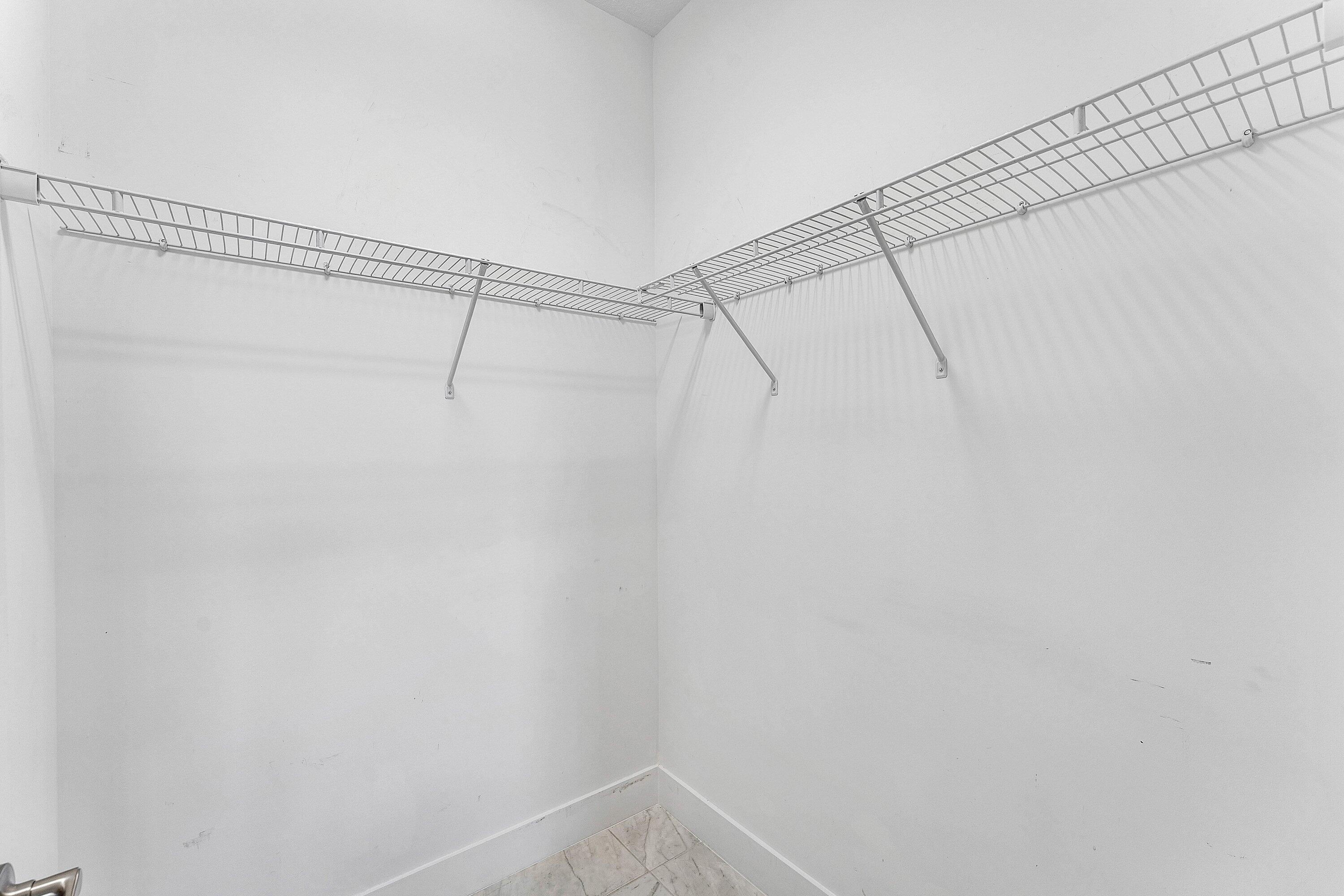 4821 Pointe Midtown Road Palm Beach Gardens, FL 33418 - Photo 21 of 34 Guest 2 Walk-In Closet