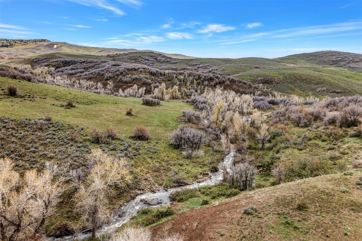 80 County Road 80 Steamboat Springs, CO 80487 - Photo 18 of 43 a view of a mountain with an outdoor space