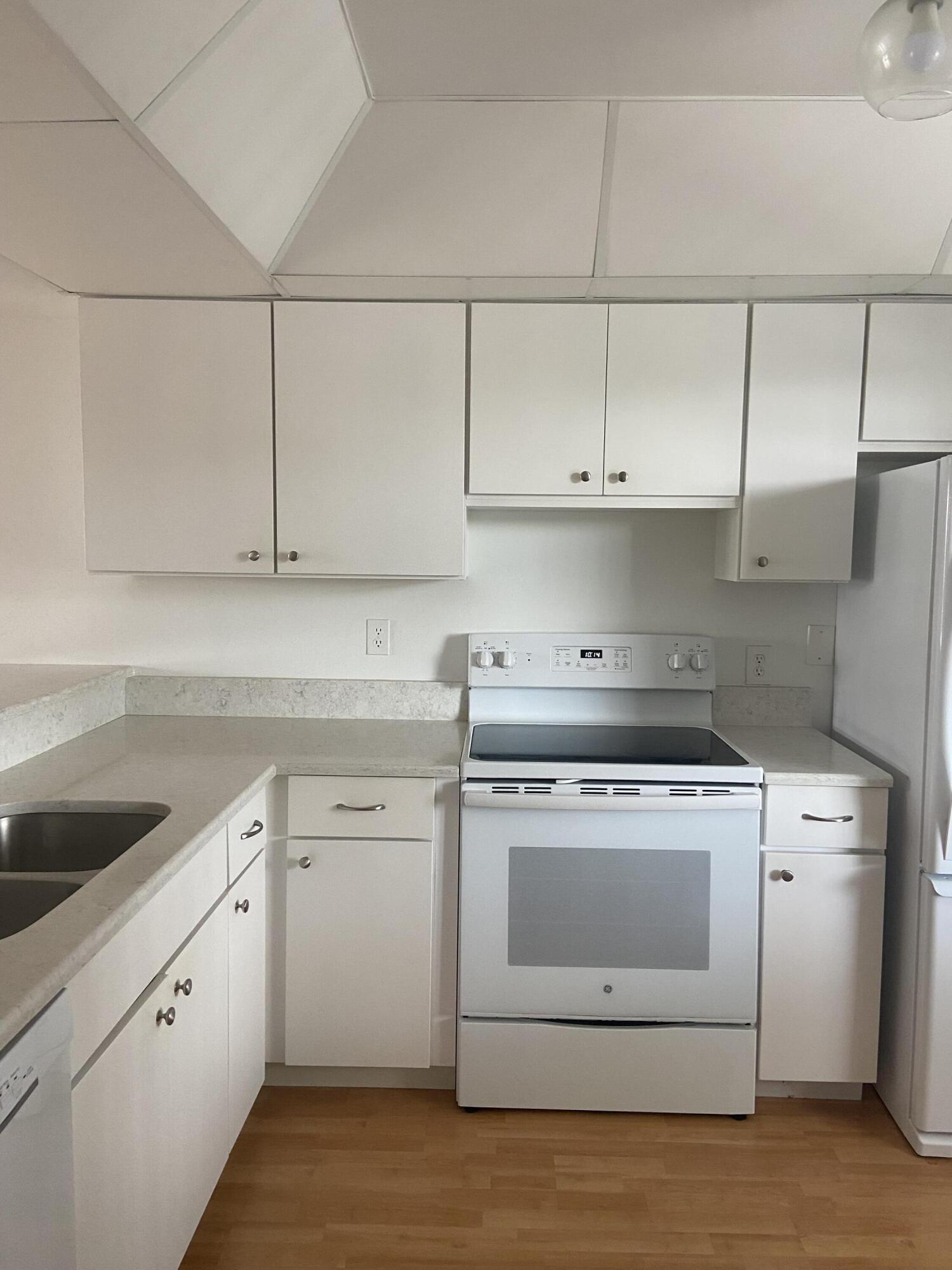 1950 Southwest Palm City Road, Unit 6305 Stuart, FL 34994 - Photo 3 of 18 6305 full kitchen view