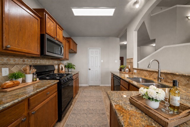 6047 Northcrest Village Way Spring, TX 77388 - Photo 9 of 30 Digitally staged kitchen to show use of space & design potential.
