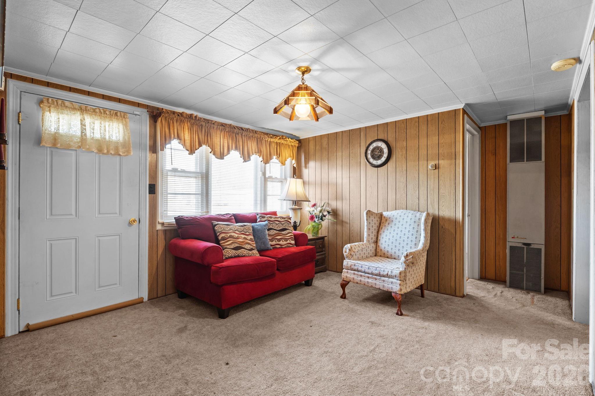 407 Conwell Road Pleasant Hill, NC 27866 - Photo 11 of 31 a living room with furniture and a window